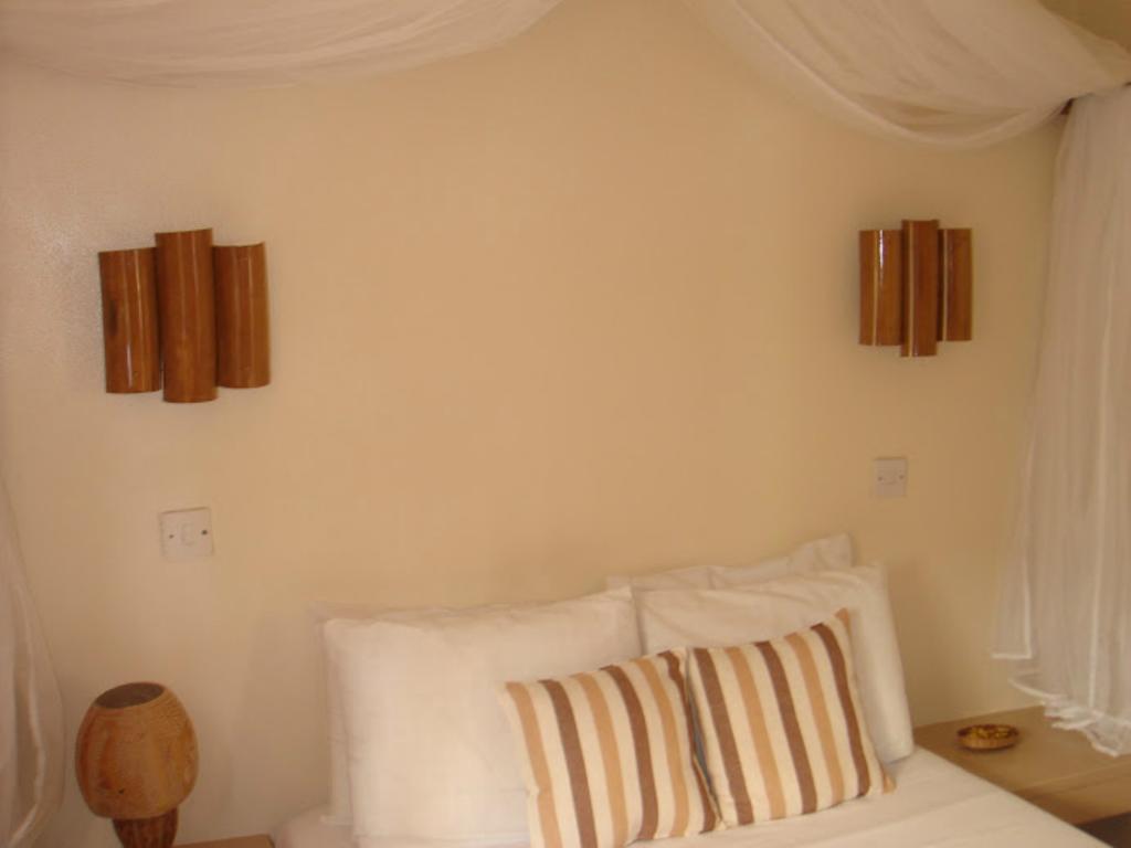 Calibishie Lodges Hotel Quarto foto