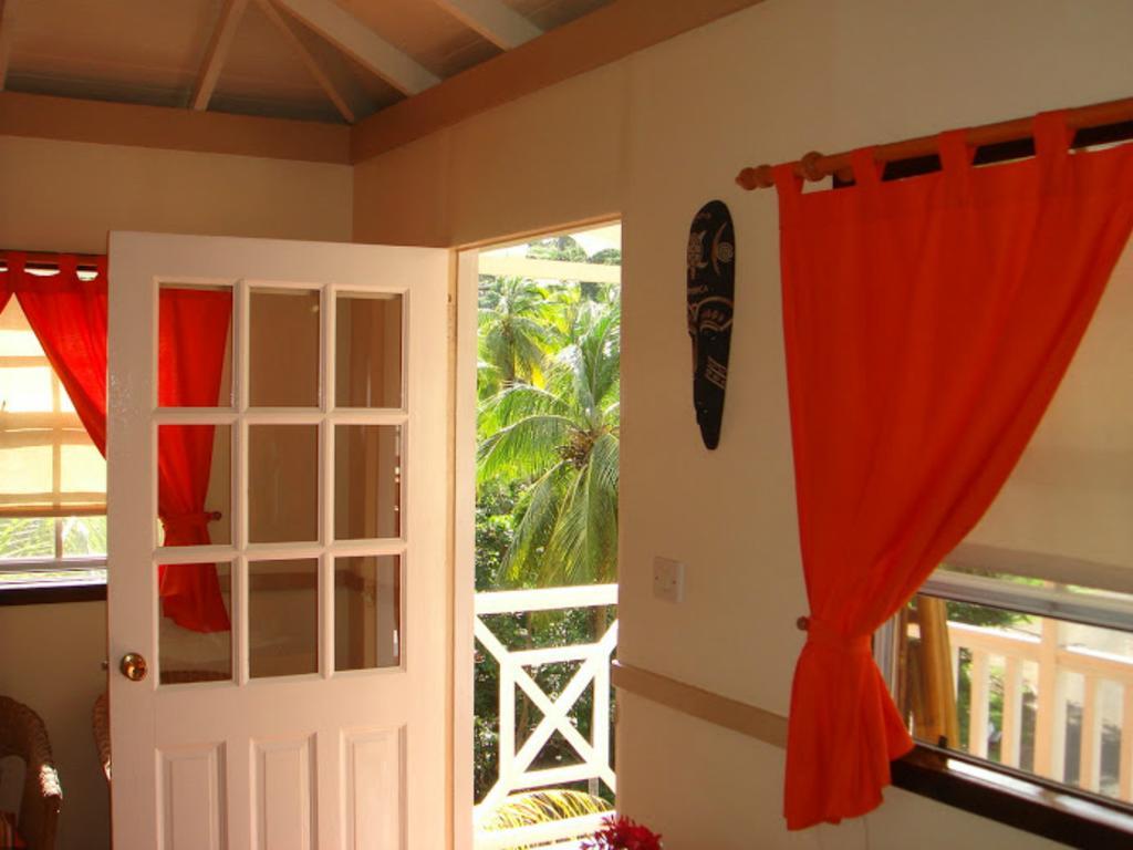 Calibishie Lodges Hotel Quarto foto